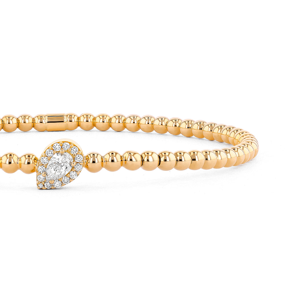 Couture Gold Bead With Pear-Shaped Diamond Halo Center Stretch Bracelet